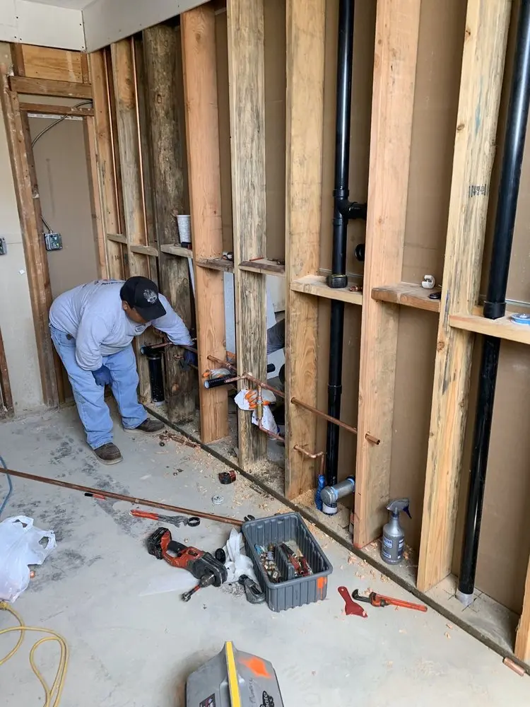 Commercial rough-in plumbing for Water Heater Replacement in Elysian